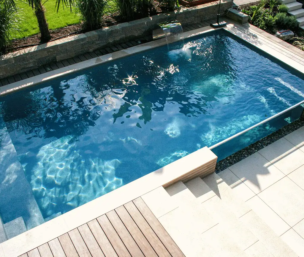 Pool with timber deck and glass wall corner, seen from above in Villingen-Schwenningen