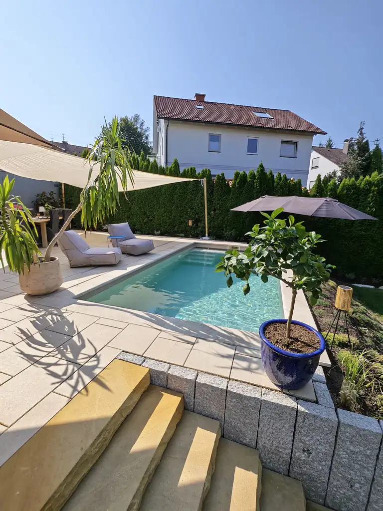 Pool with shade sail, overall view of the terrace in Villingen-Schwenningen